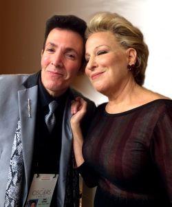 A man with Bette Midler